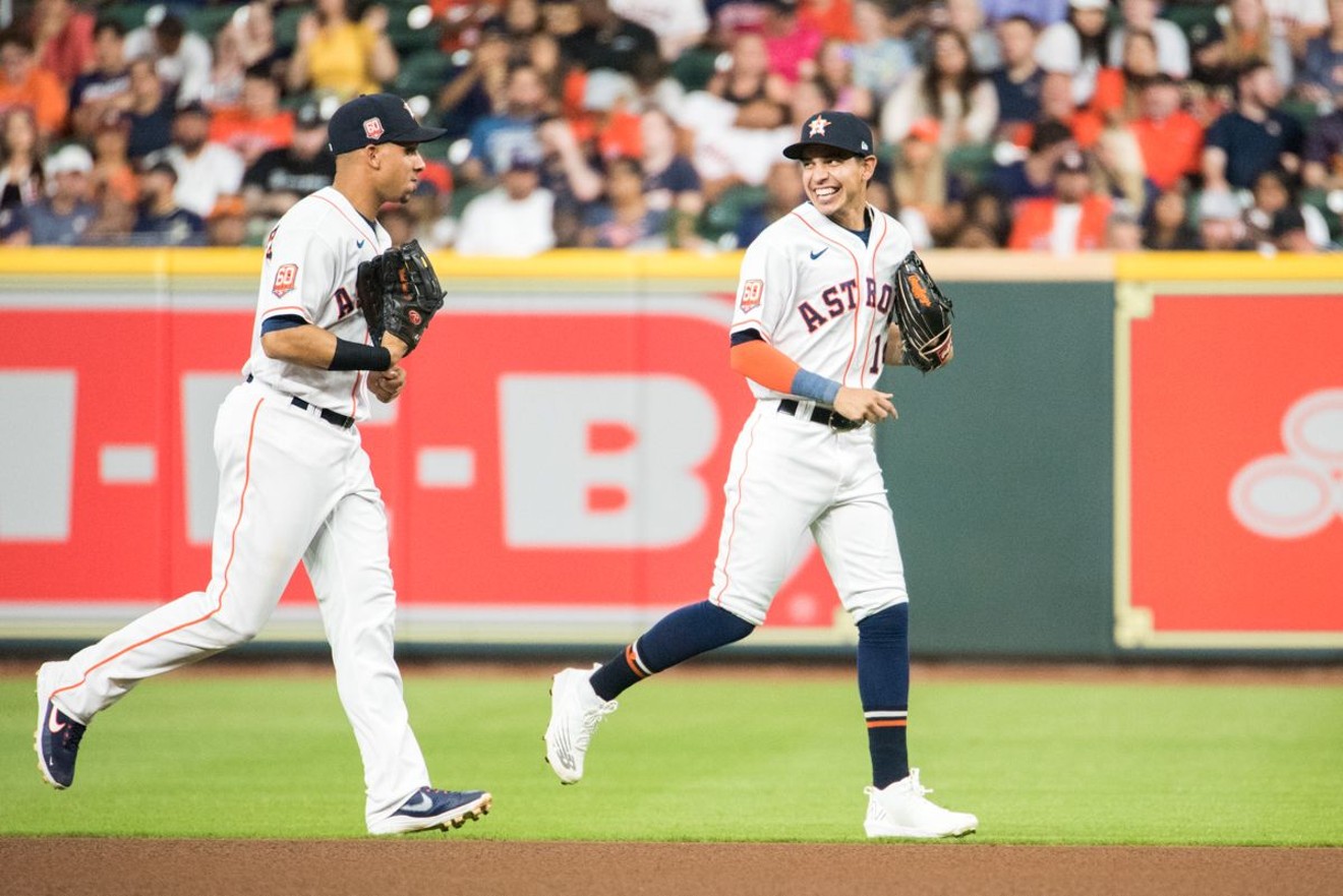 Houston Astros relief pitcher Parker Mushinski looks in at the