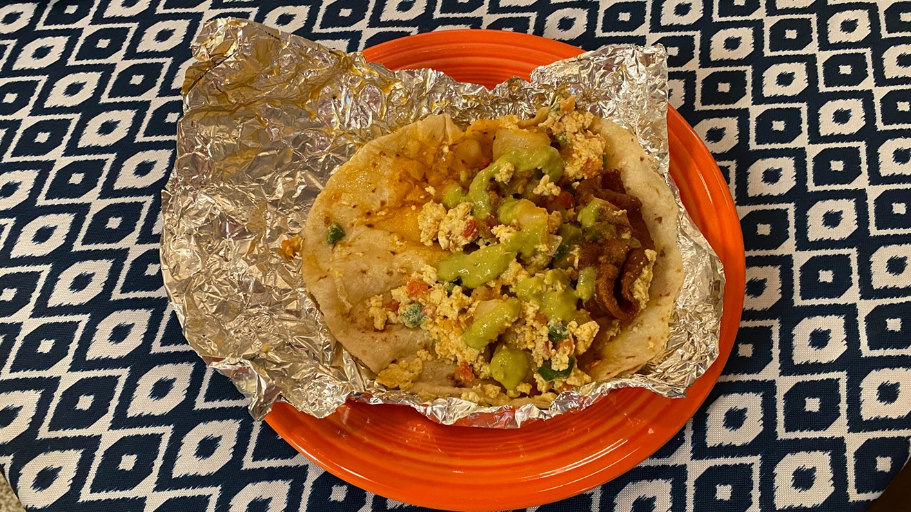 Laredo Taqueria's spicy potatoes pair great with bacon and eggs in this triple-threat breakfast taco.