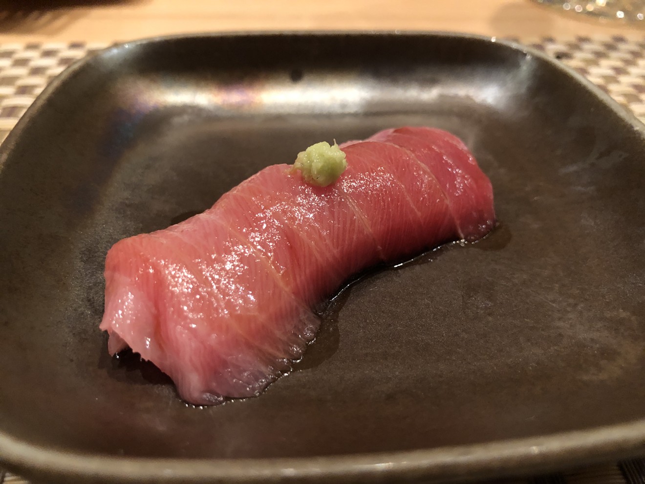 A perfect piece of chu toro nigiri sushi at MF Sushi