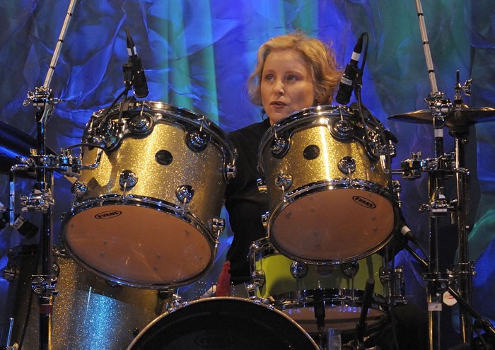 Gina Schock onstage with the Go-Go's in recent years.