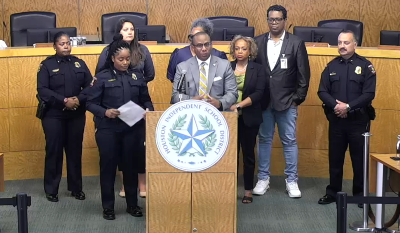 Superintendent Millard House II, HISD police officers and board members at Wednesday's press conference.