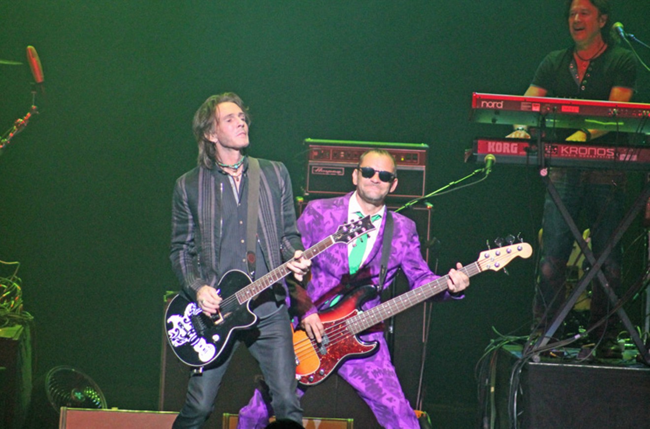 Rick Springfield and band membes Sigve "Siggy" Sjursen and Tim Gross onstage at the Smart Financial Centre.