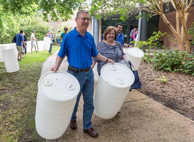 rain barrels being picked up at a past event