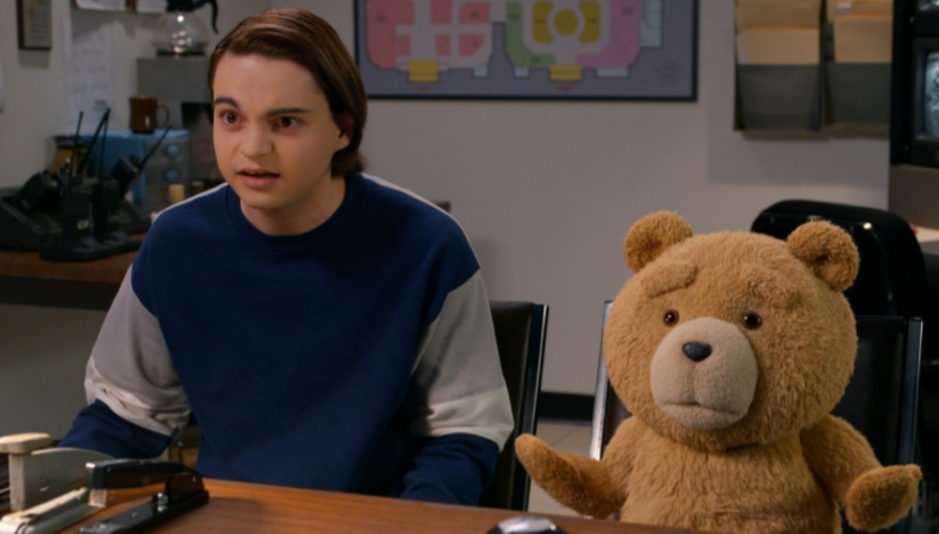 Max Burkholder as John and the voice of Seth MacFarlane as Ted.