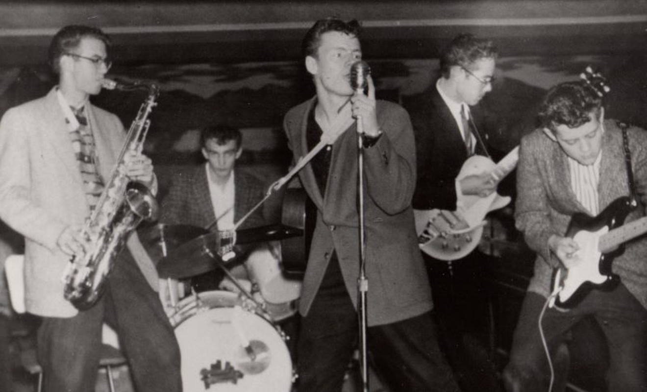 Delbert McClinton and his band the Straitjackets whipping the crowd into a frenzy around 1960.  His new album Outdated Emotion returns McClinton to the music that he heard growing up in Fort Worth.