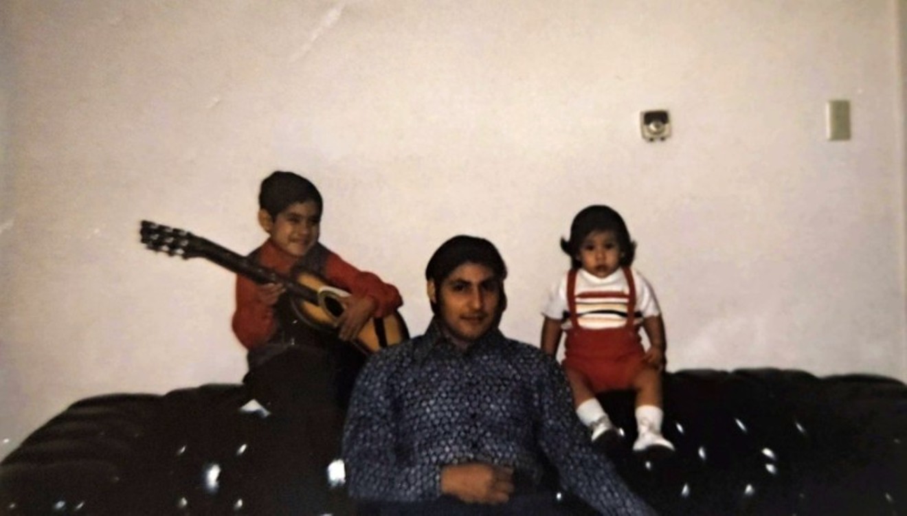The author (with guitar he never learned to play), his brother and their father, a music lover.