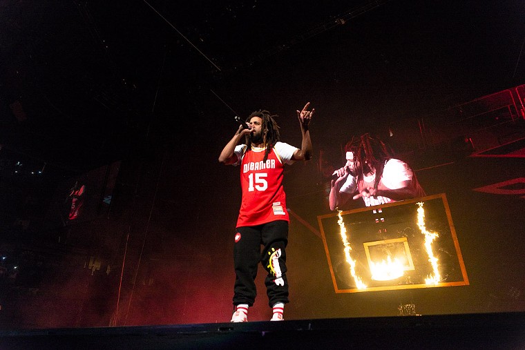 J. Cole at Toyota Center, sporting a "Dreamer" jersey. - PHOTO BY JENNIFER LAKE