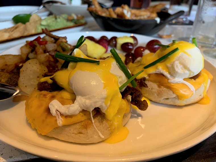 The Cheesy Bacon Benedict is a weekend calorie splurge. - PHOTO BY LORRETTA RUGGIERO