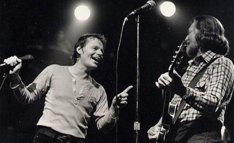 Delbert McClinton jamming with fellow Texas music legend Willie Nelson at Austin's Club Foot in 1982. - PHOTO BY WATT CASEY