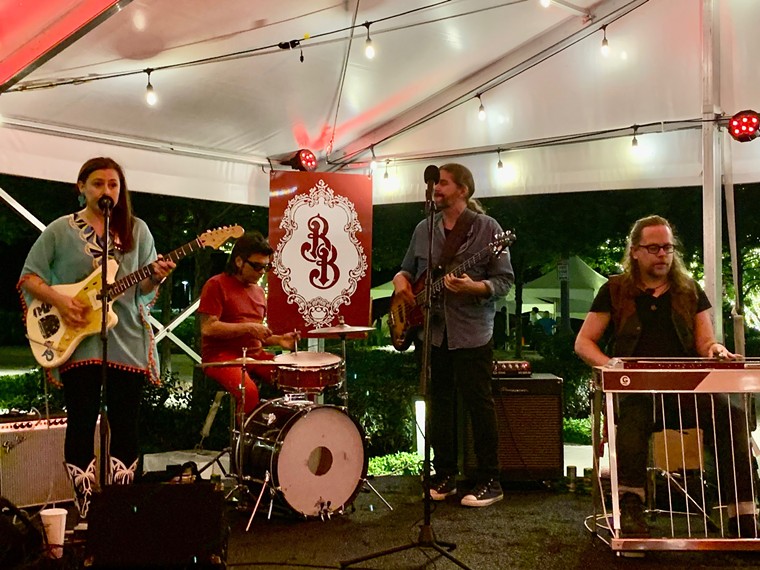 The Sophia Johnson Band kept the tent moving.  - PHOTOGRAPH BY LORRETTA RUGGIERO