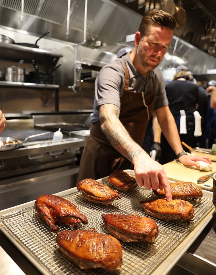 Chef Shaun King prepares the dry-aged duck. - PHOTO BY HAI HOSPITALITY