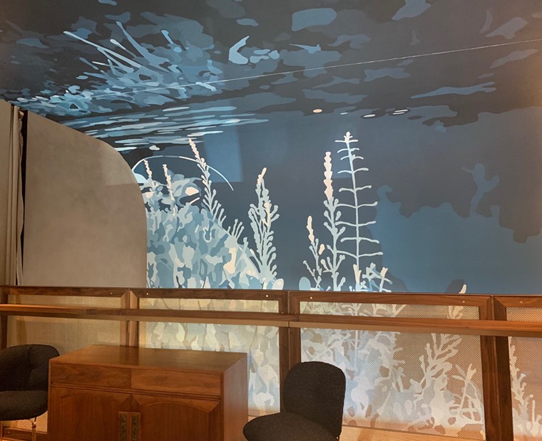 A mural from local artist Camille Remington gives a calming touch to the decor. - PHOTO BY LORRETTA RUGGIERO