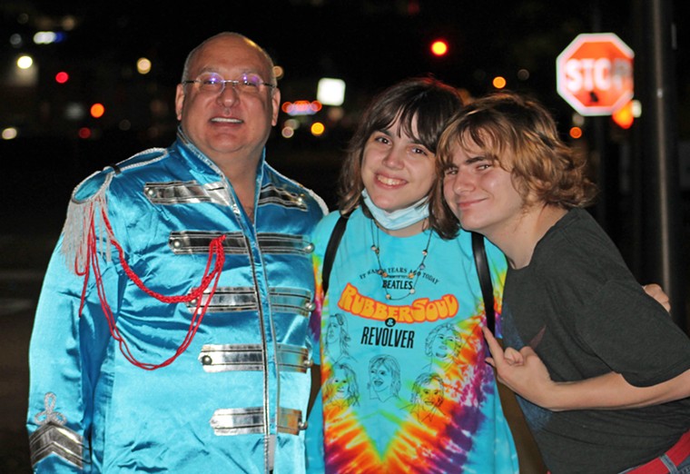 Former Houston METRO Chairman and Houston Downtown Management District Board of Directors Secretary Gilbert Garcia impressed young Beatlemaniacs Emma Ruggiero and Frank Landry with his custom-made Paul McCartney/Sgt. Pepper outfit. - PHOTO BY BOB RUGGIERO