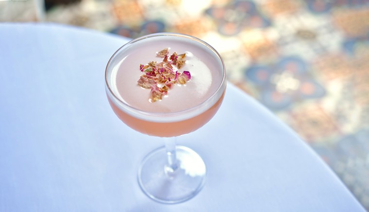 Le Colonial's La Vie en Rose cocktail is as refreshing as it is beautiful. - PHOTO BY ALEX MONTOYA