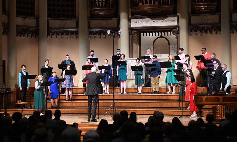 Even though the choir is composed of less than 30 singers, their voices saturate any performance space with grace, precision and oh-so-beautiful music. - PHOTO BY JEFF GRASS PHOTOGRAPHY