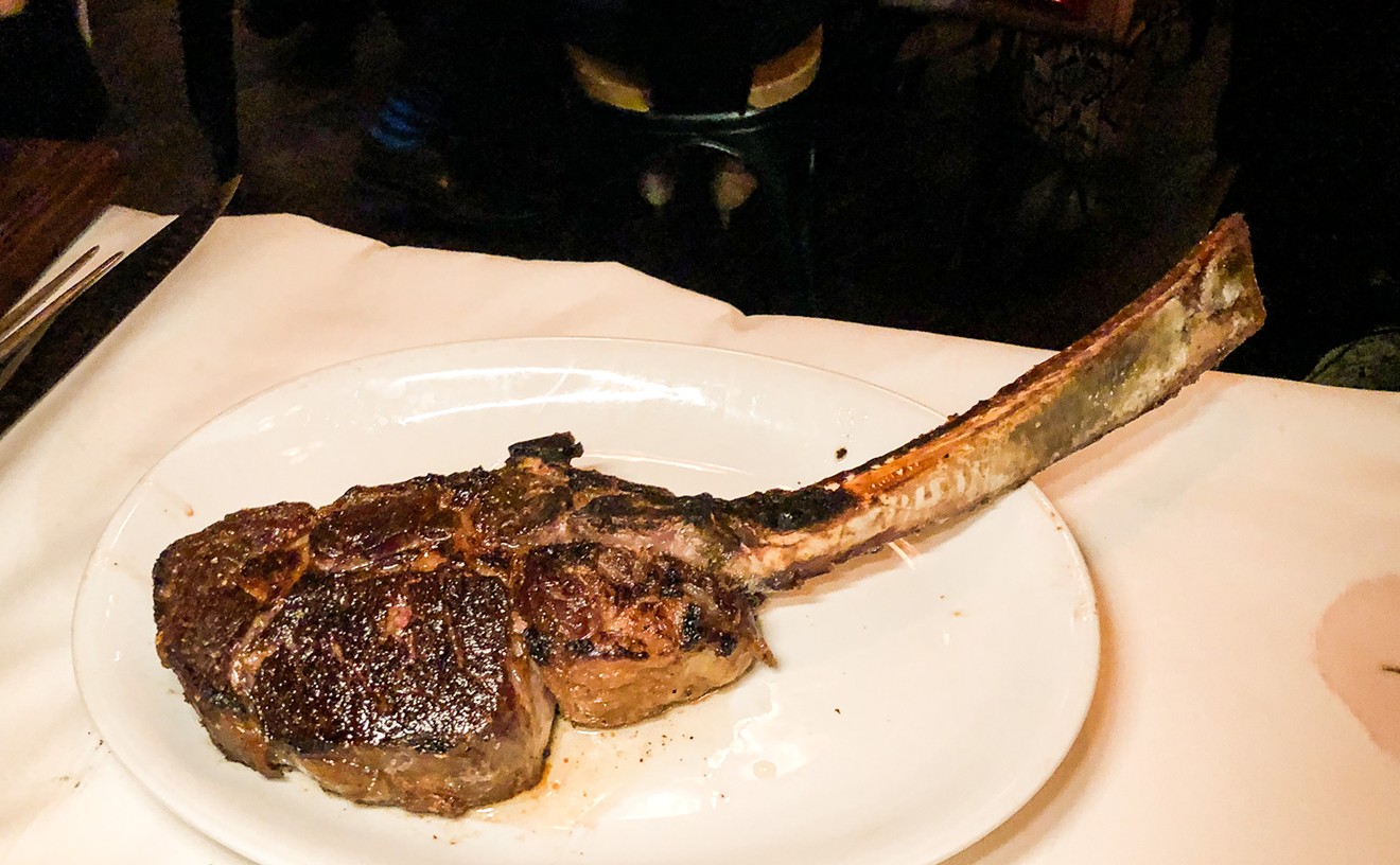 A magnificent long bone-in ribeye steak at B&B Butchers