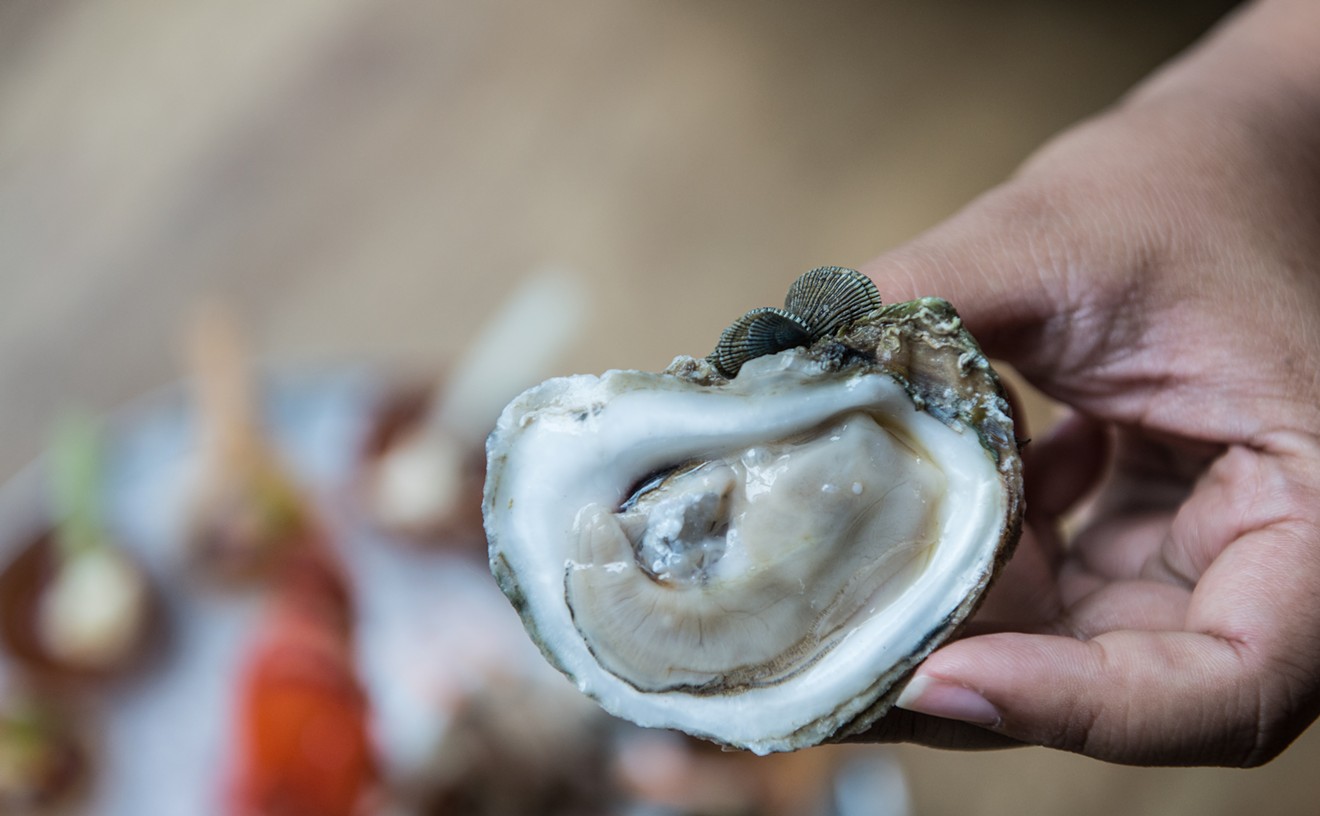 Shuck for a buck during Brennan's Courtyard happy hour.