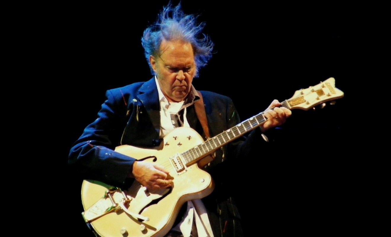 Neil Young, seen here delivering a hair-raising live performance, has released a 50th anniversary edition of his classic album Harvest which includes outtakes, television performances and a documentary film.
