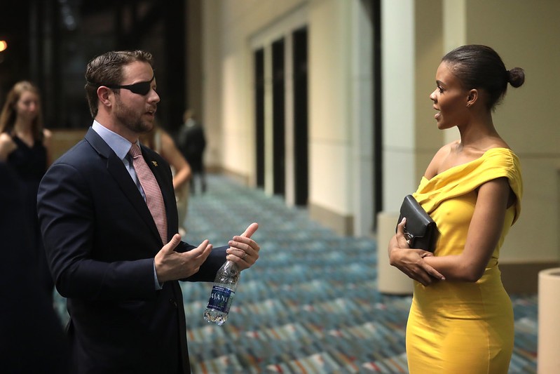 Candace Owens and Houston U.S. Rep. Dan Crenshaw at a 2018 Turning Point USA event in Palm Beach, Florida.